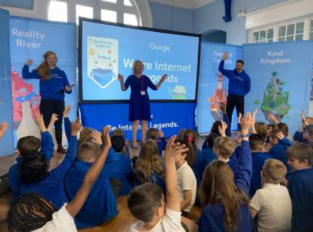 Children raise tehir hand during Google Internet Legends presentation